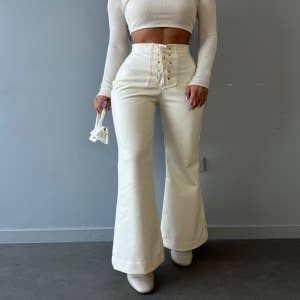 Purchase Wholesale leather flare pants. Free Returns & Net 60 Terms on Faire