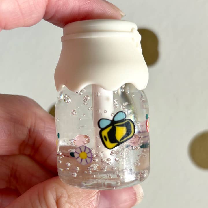 Lucidalabbra Bottiglia Bianca Floral Bee per la vendita all'ingrosso da parte di Live Sweet