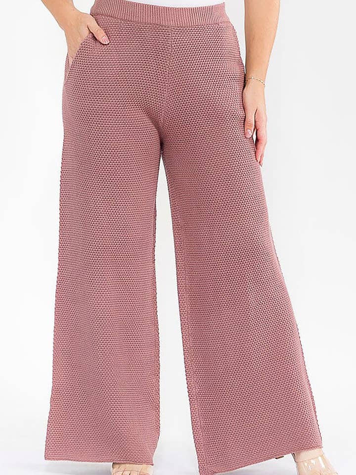 PANTALON LARGE À JAMBES ÉLASTIQUES À LA TAILLE AVEC POCHES DEVANT EN MAILLE pour la vente par ROUSSEAU
