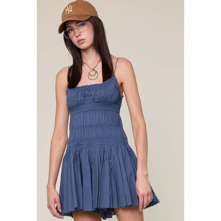 SOLID COLOR SLEEVELESS SMOCKED TORSO MINI ROMPER for wholesale by Sky to Moon