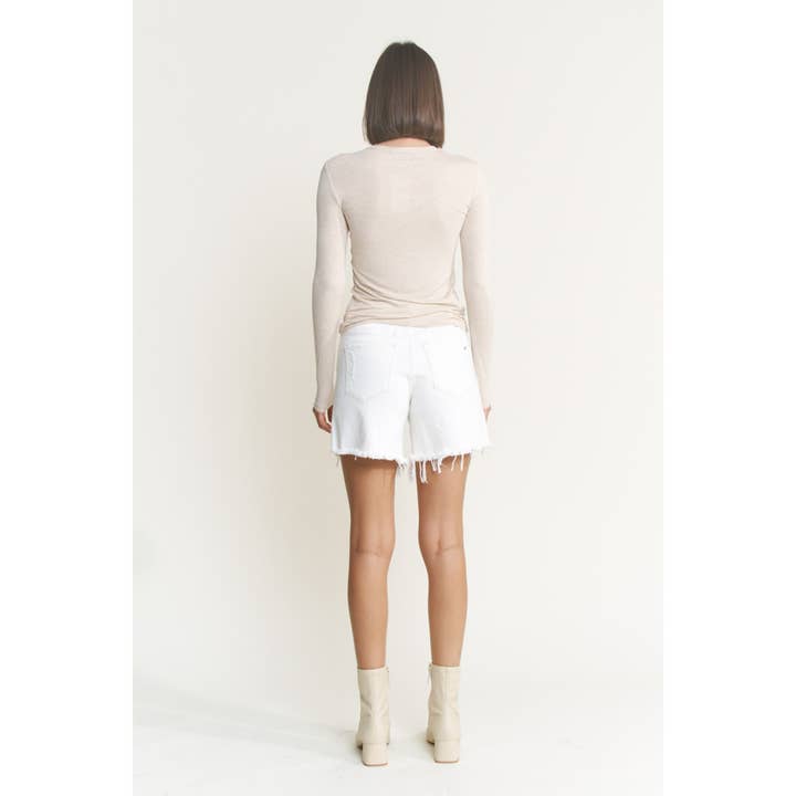 MISTY WHITE HIGH RISE DISTRESSED FRAYED HEM SHORTS for wholesale on Faire
