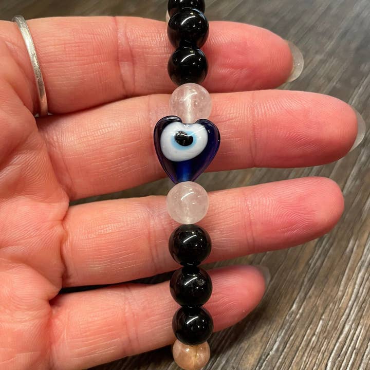 Evil Eye glass Heart Bead with a Yin Yang Protection Handcrafted Natural Stone and Crystal Reiki Infused Cleansed Tourmaline Quartz Sunstone for wholesale by PetrichorKC