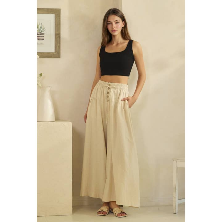 CALÇAS LARGAS COM PREGAS LAVADAS por atacado de Oli&Hali