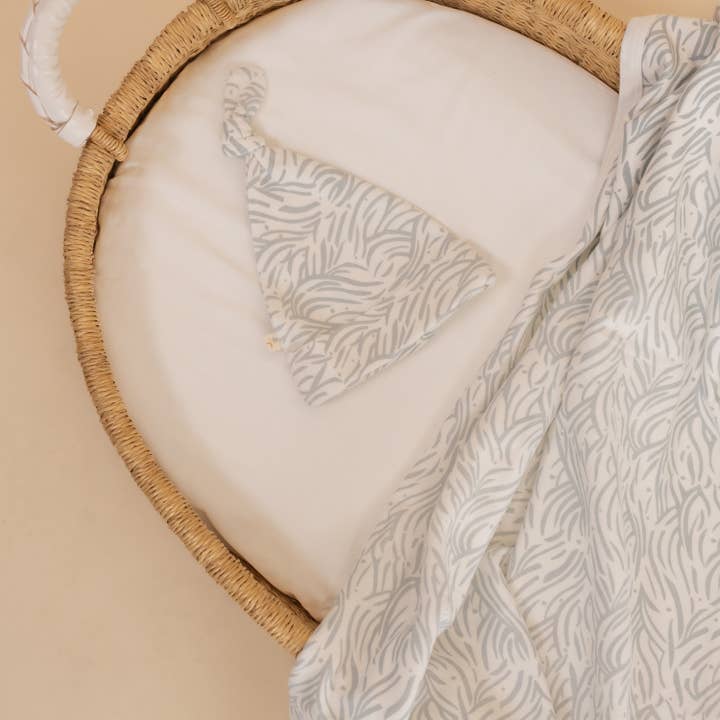 Organic Swaddle Blanket & Hat Set - Waves for wholesale by Makemake Organics