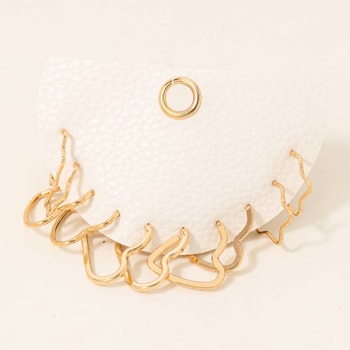 Ensemble de créoles découpées en forme de cœur assorti pour la vente par Fame Accessories