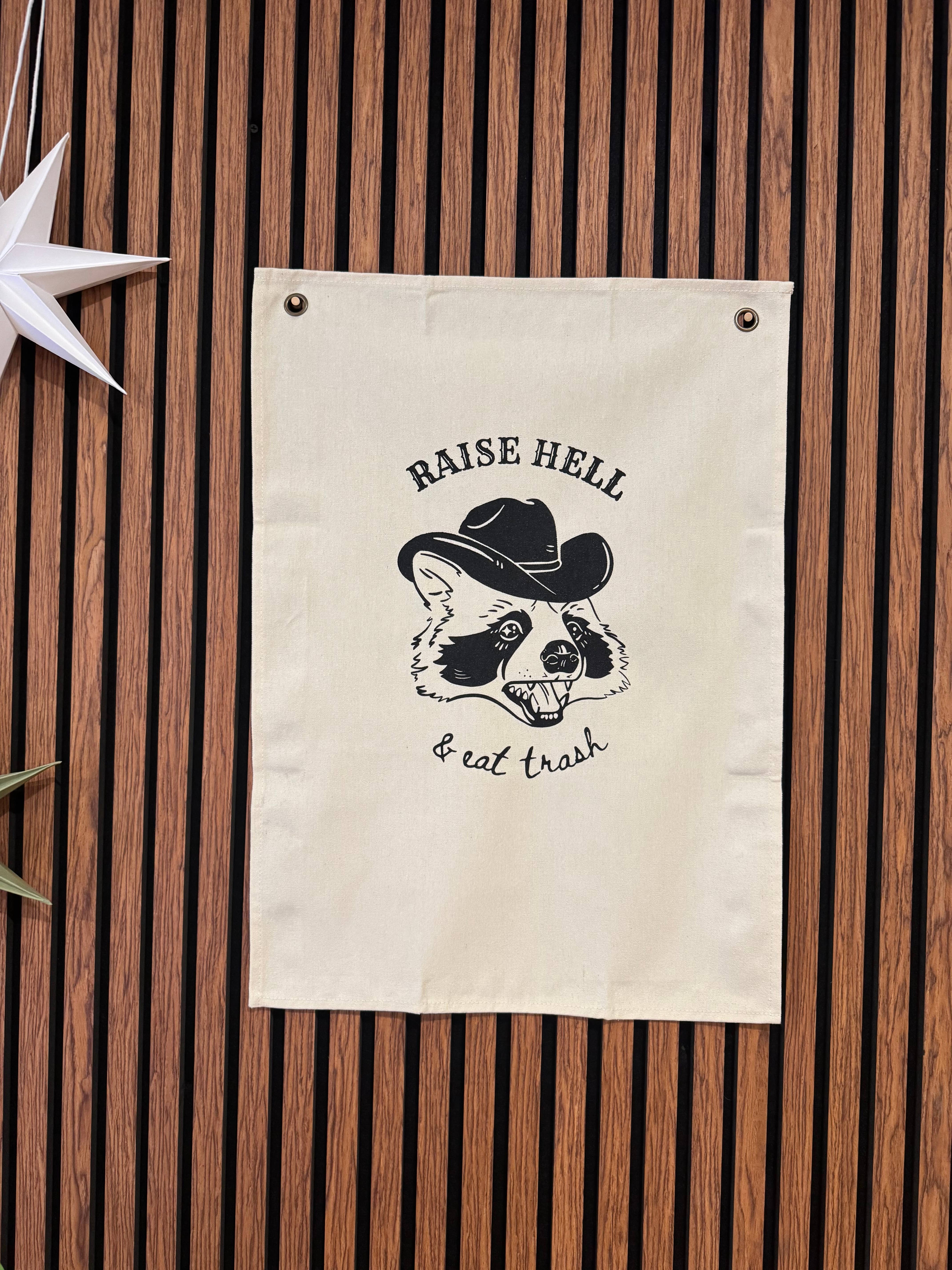 Uncommon Wild - Wholesale Banner - Raise Hell & Eat Trash Raccoon Canvas Banner1