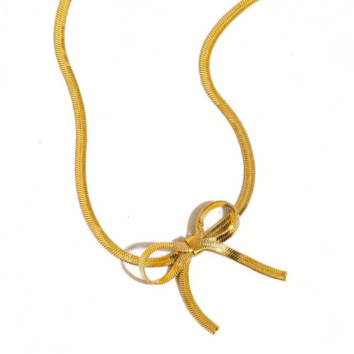 Marie 18K Gold Non-Tarnish Flat Snake Bow Choker for wholesale on Faire