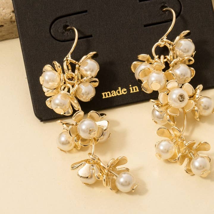 G Pearl Flower Cluster Chain Dangle Earrings for wholesale on Faire1