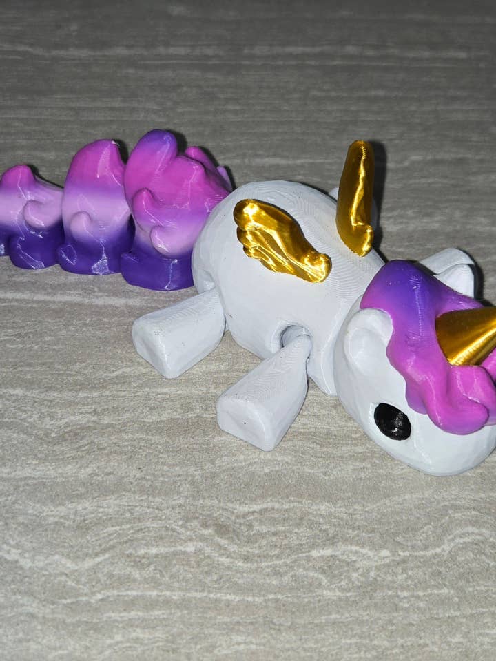 Unicorno stampato in 3D | Statuetta articolata | Flexi Animal per la vendita all'ingrosso da parte di Cosmic 3D Creations