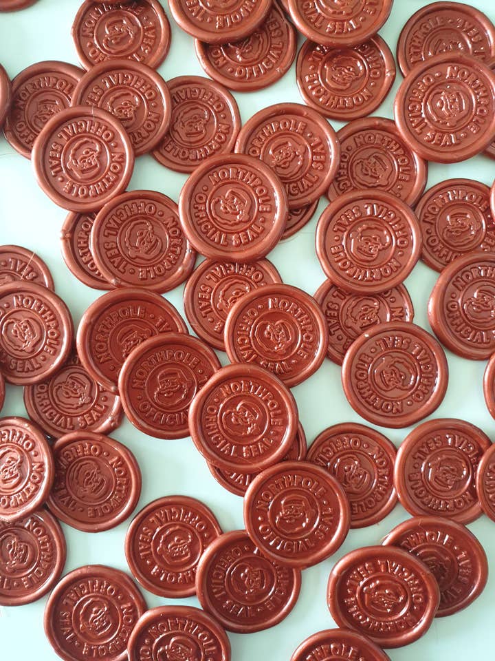 Pack of 100 North Pole Official Self Adhesive Wax Seals for wholesale by littleaddedtouches