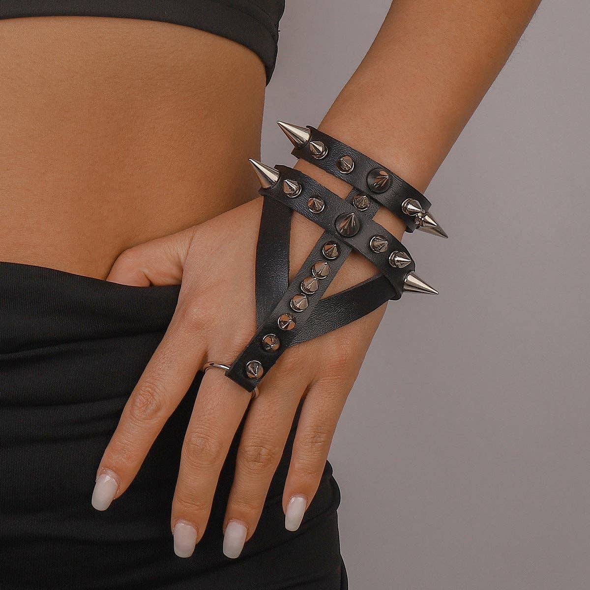Black Punk Rivet Finger Bracelet B3842 for wholesale on Faire6