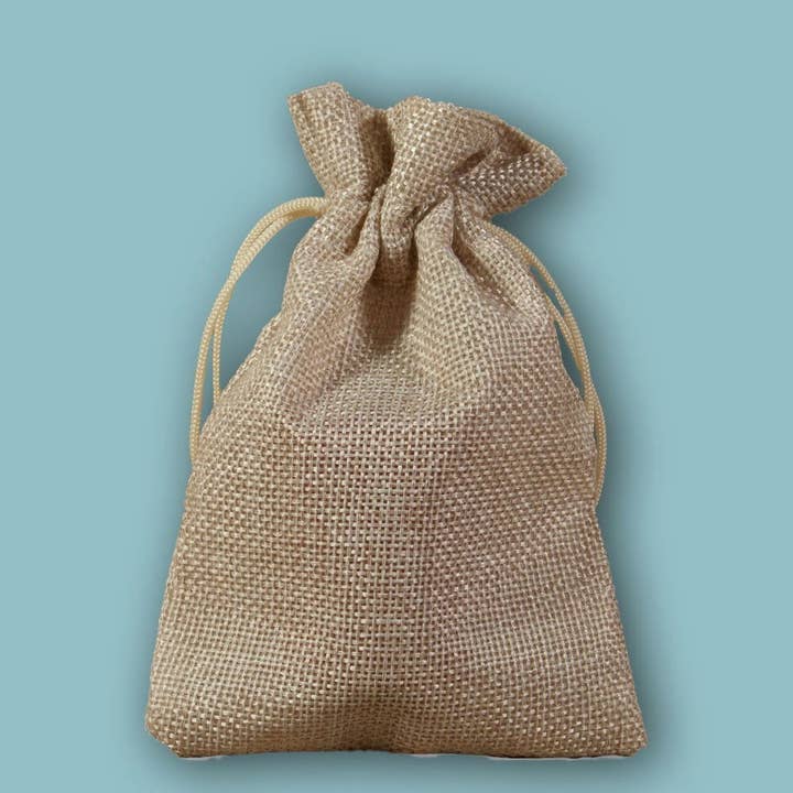 Bleached jute bag for wholesale by kadopapier.net