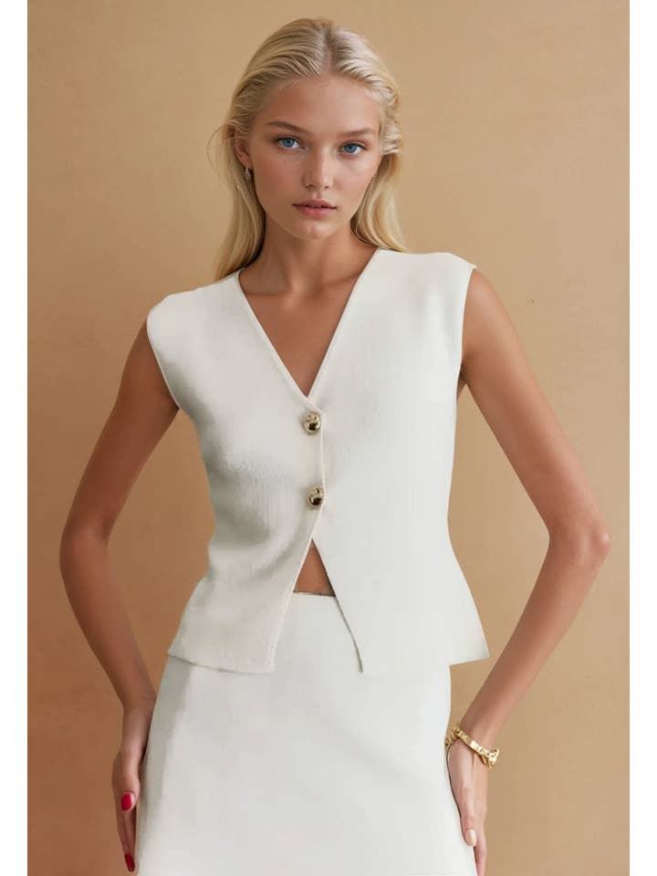 IVORY FINE KNIT BUTTONED SLEEVELESS TOP W1557TIA for wholesale on Faire