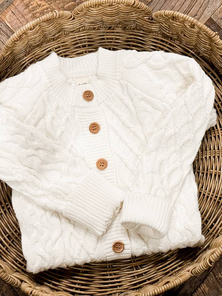 Cream Cable Knit Button Up Romper for wholesale on Faire3