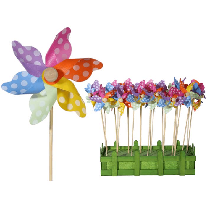 Multicoloured windmilll with white dots on wooden, for wholesale by Out of the blue KG