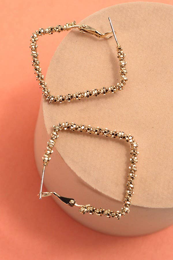 Gold DAIMOND DUST CUT SQUARE HOOP EARRINGS | 31E24414 for wholesale on Faire1