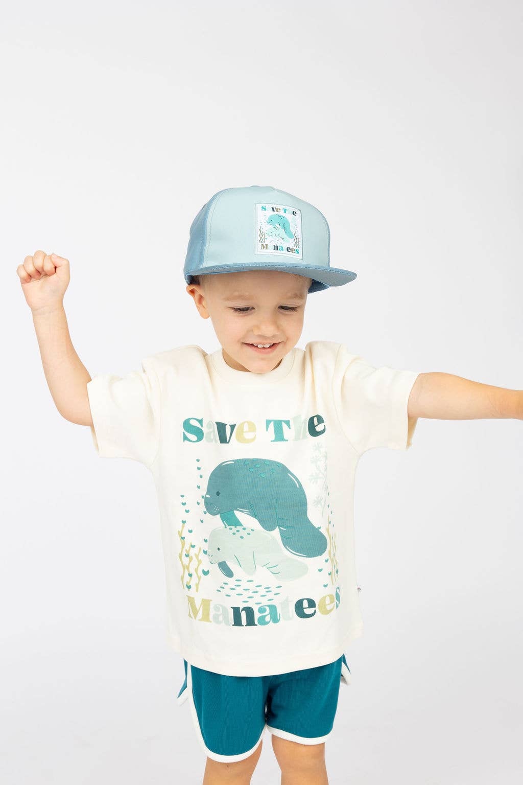 Blue Multi Save the Manatees Ocean Conservation Kids Snapback Hat for wholesale on Faire3