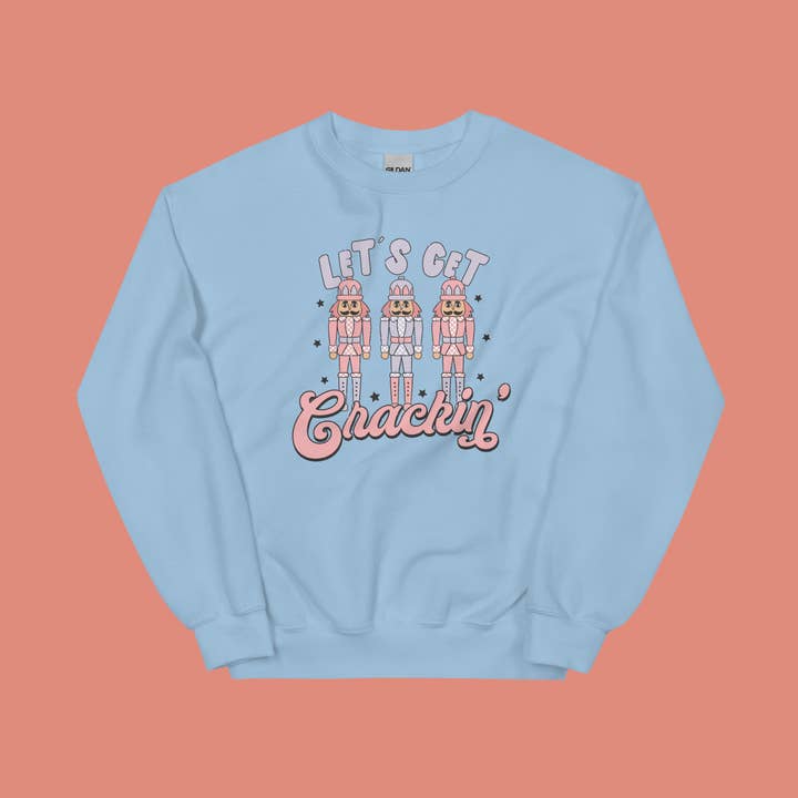 Divertente maglione a girocollo natalizio Let's Get Crackin' per la vendita all'ingrosso da parte di a riley creations