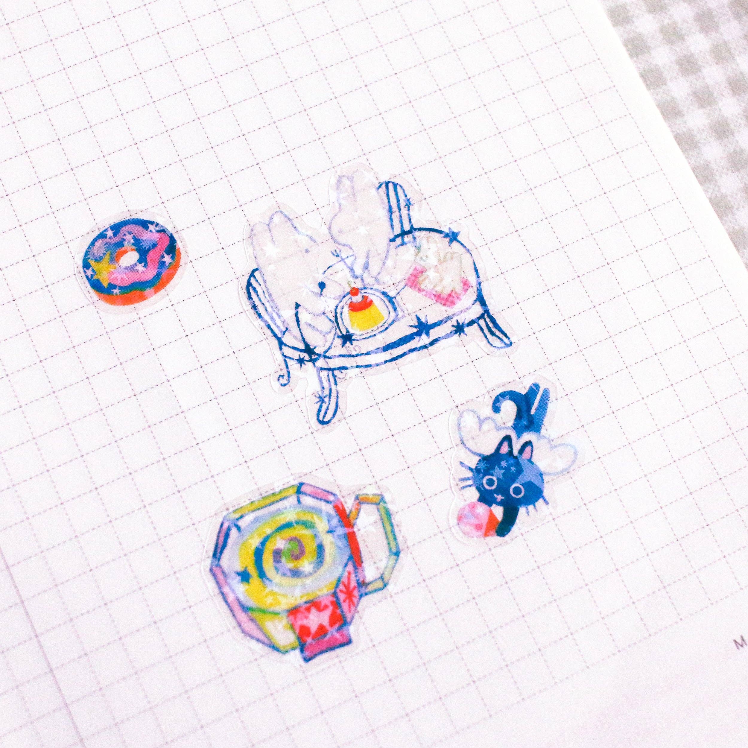 Odd Rabbits - Wholesale Sticker - 'Cosmic Cafe' Star Holo Transparent A6 Sticker Sheet1