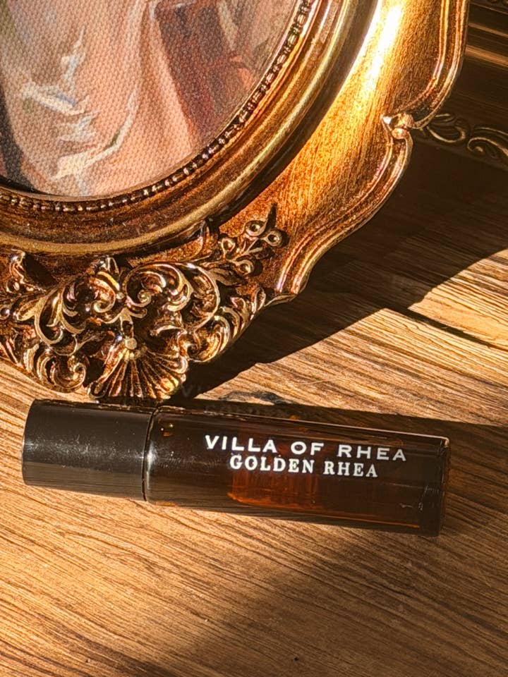 Golden Rhea Perfume Rollerball | Amber, Patchouli & Sandalwood for wholesale by Villa of Rhea