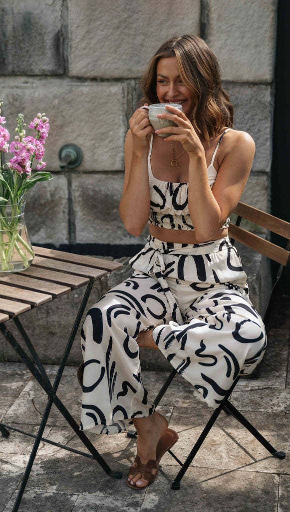 White Printed Sleeveless Strap Short Top Long Wide Leg Pants Set for wholesale on Faire6