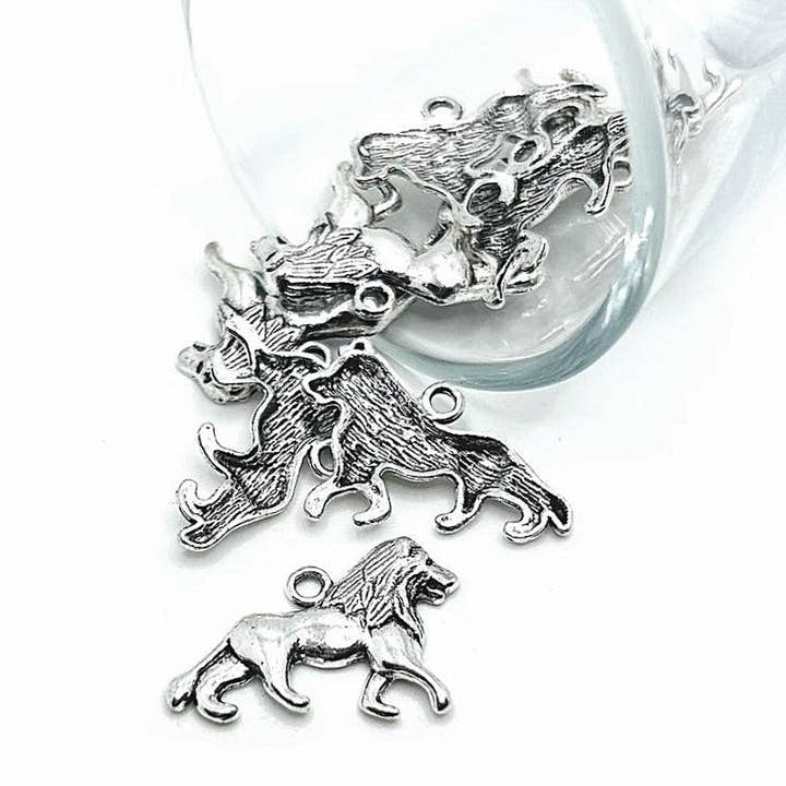 Silver Lion Charms, 16x26mm for wholesale by Guerrilla Charm