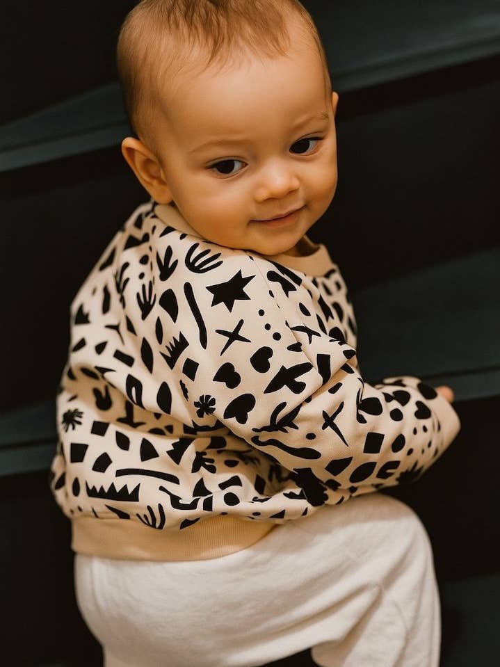 Suor bebé Geométrico preto cru em algodão biológico por atacado de You&Milk