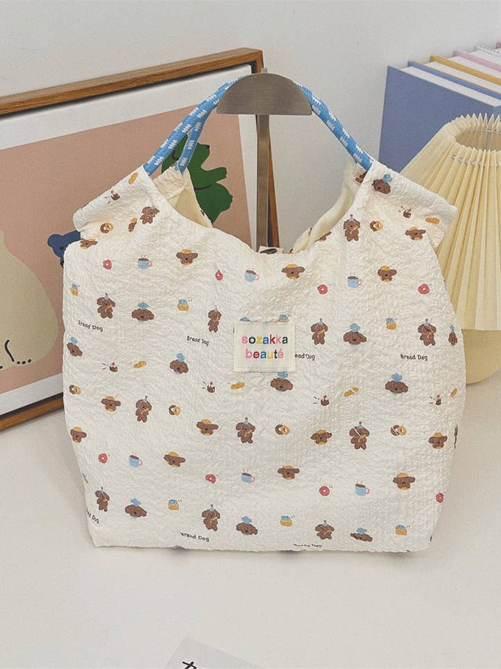 CWAB3909_CARTOON EMBOSSED CANVAS COMMUTER HANDBAG for wholesale by NINEXIS