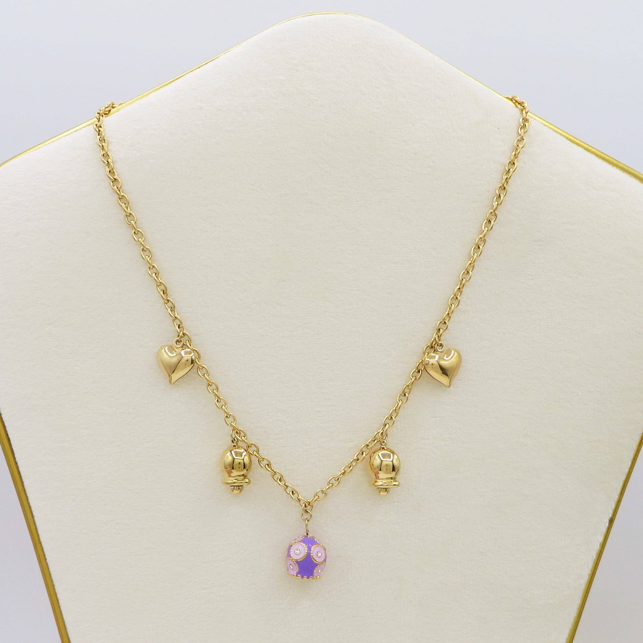 LILLA ORO ROSABELL - ACCIAIO INOSSIDABILE- Collana con campanella e cuori bombe' chiama angeli for wholesale on Faire3