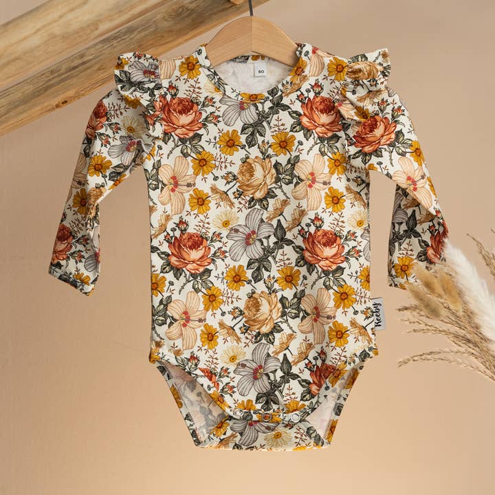 Body med flæser til babyer og småbørn for engroshandel hos Reeby