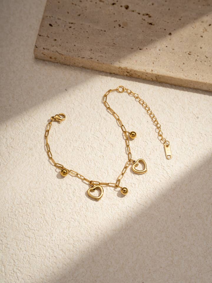 Stainless steel heart charm bracelet for wholesale by COSMOS