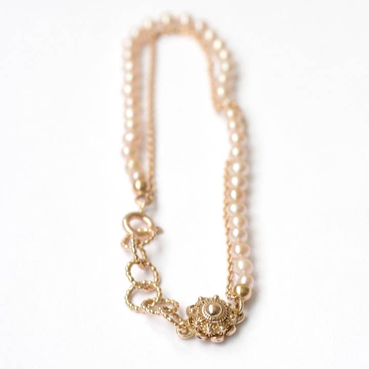 Bracciale Zeeland nodo in oro rosso con perle rosa per la vendita all'ingrosso da parte di Hester Zagt Sieraden