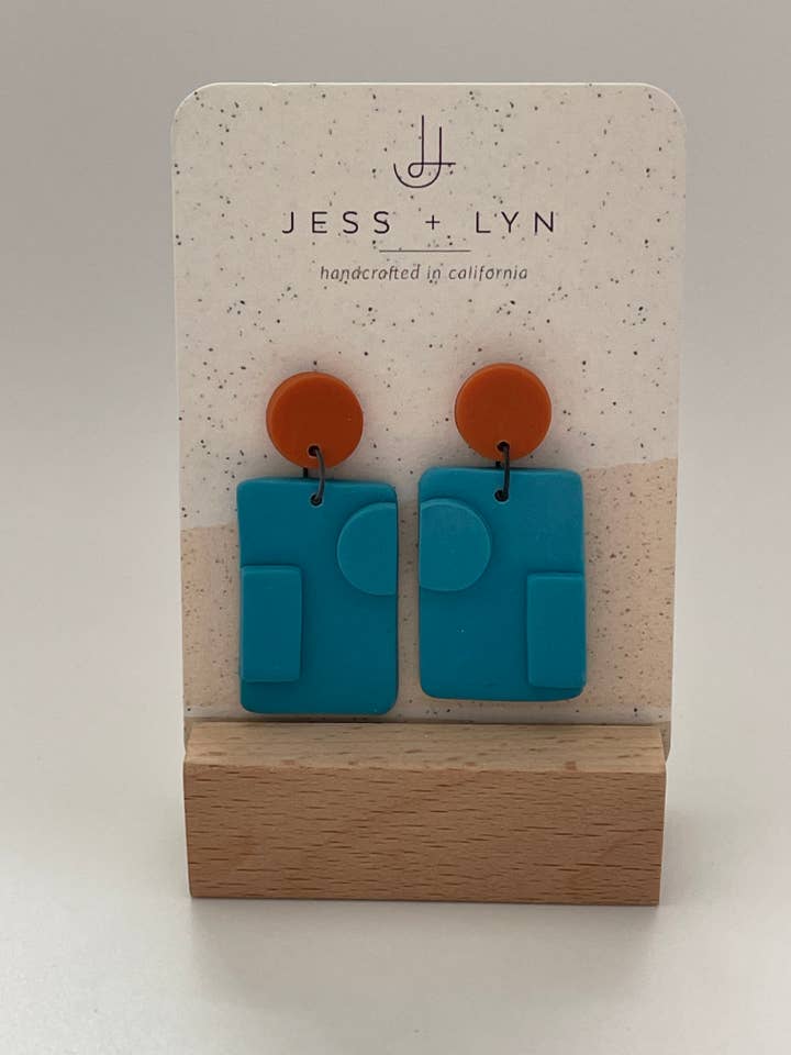 Boucles d'oreilles en pâte polymère orange/turquoise pour la vente par Jess+Lyn