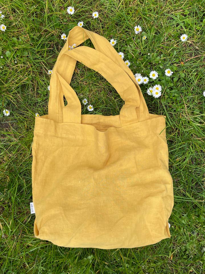 buttercup linne tote för wholesale av still well.