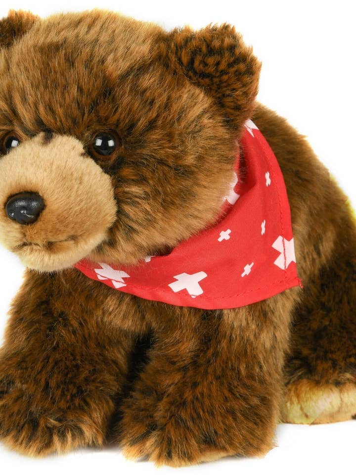 Brown bear with scarf, standing - cuddly/plush toy for wholesale by Uni Toys