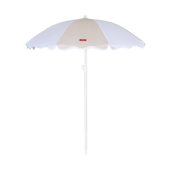 Beige umbrella with thick stripes and wavy design and other Purchase Wholesale beach shade. Free Returns & Net 60 Terms on Faire trending on Faire.