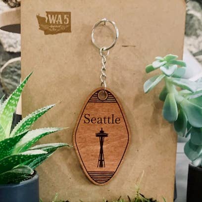 Porte-clés souvenir gravé au laser personnalisé pour la vente par WA5 Apparel