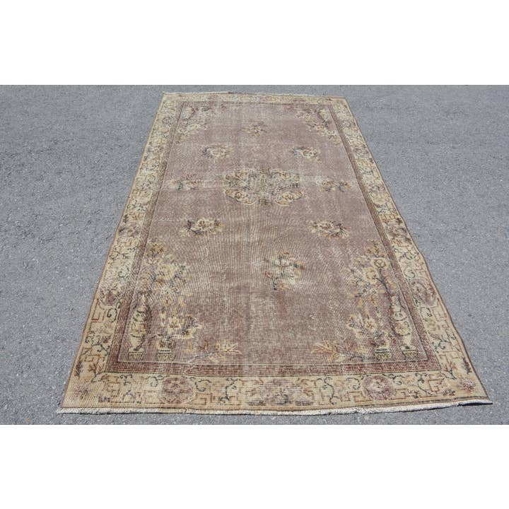 Vintage Wool Rug: Classic Handmade Brown & Beige Style for wholesale by The Loom Wholesale