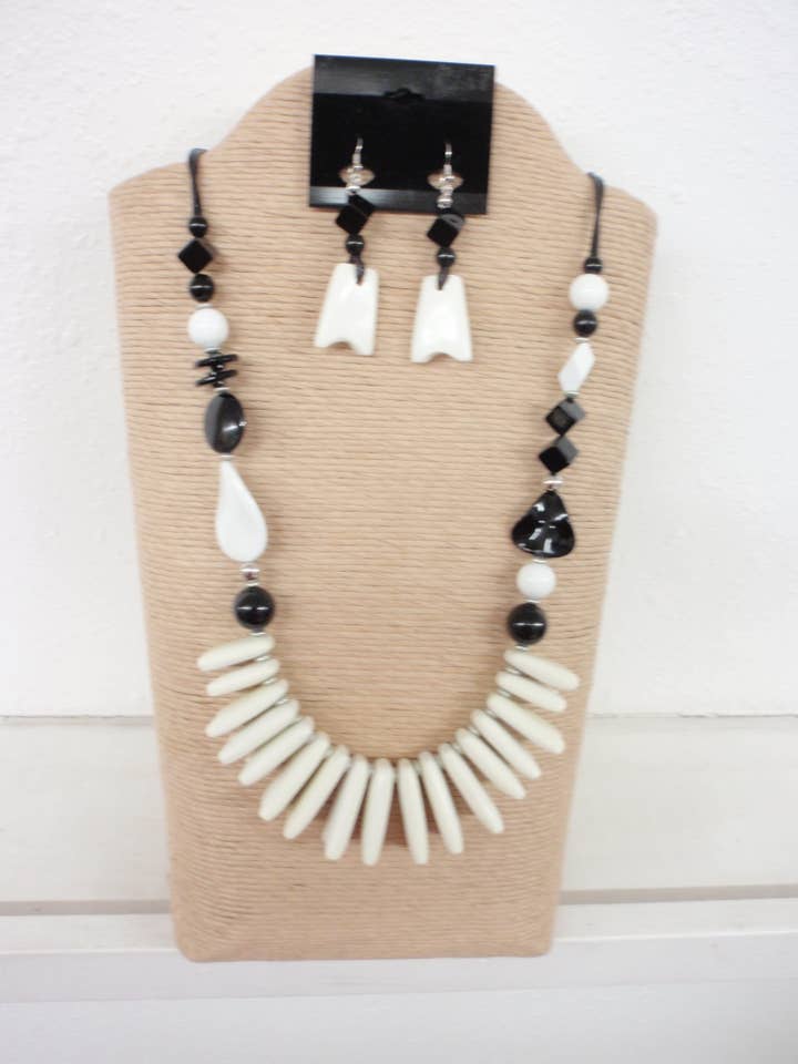 BLACK WAX CORD WITH BLACK AND WHITE WOOD IRREGULAR SHAPE NEC for wholesale by International Duru's