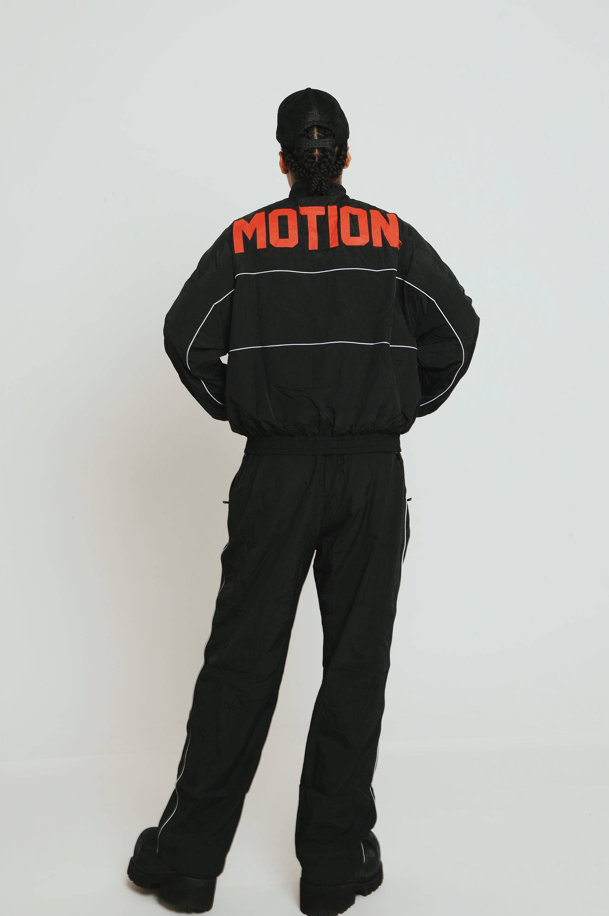 Black Red MOTION Nylon Pants (BRED) for wholesale on Faire13