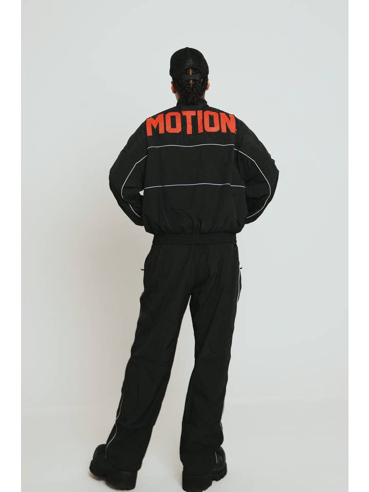 Black Red MOTION Nylon Pants (BRED) for wholesale on Faire13