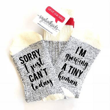 Growing Tiny Human Socks for wholesale by What She Said Creatives
