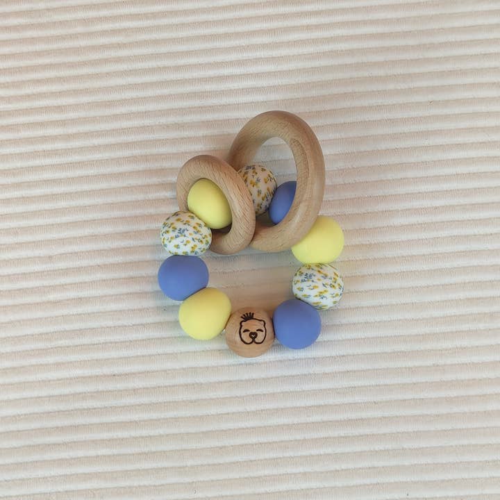 Exclusive Flower Power teether - blue-light yellow for wholesale by Little Baby Musthaves