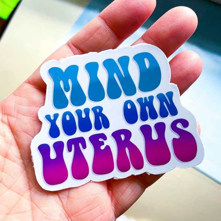Mind Your Own Uterus Vinyl Sticker for wholesale by Stone Donut Design, LLC