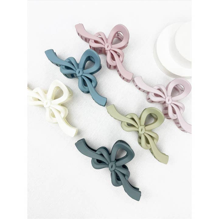MIX COLOR Knotted Bow Soft Tone Matte Hair Claw for wholesale on Faire4