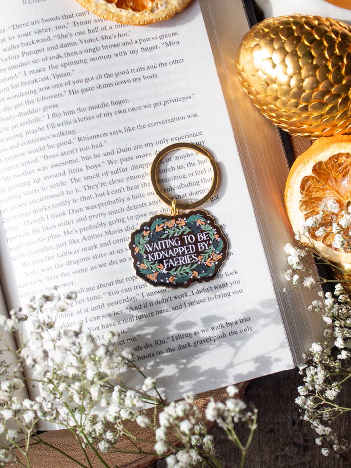 Waiting To Be Kidnapped By Faeries Enamel Keychain for wholesale by Meaggie Moos