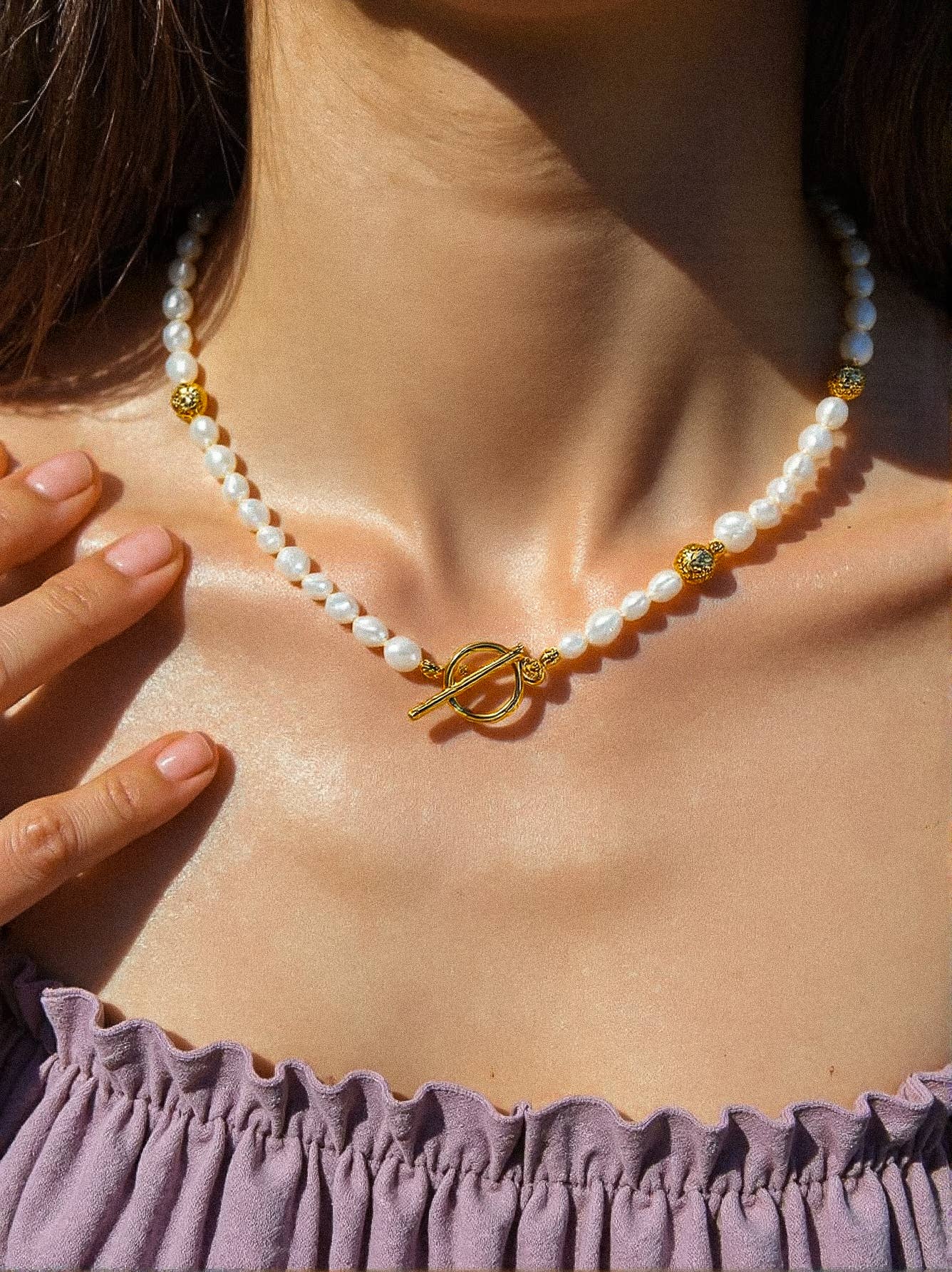 Penelope 18K Gold Natural Baroque Pearl Choker for wholesale on Faire