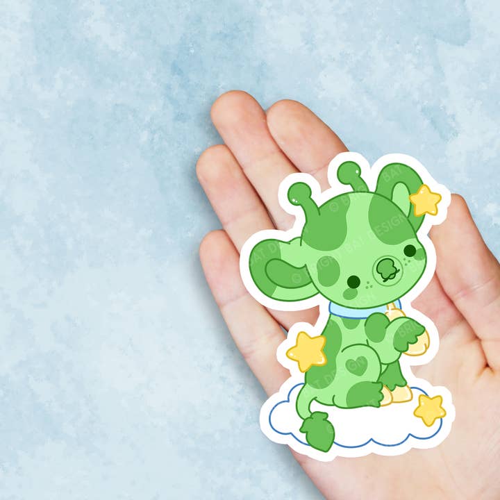 Autocollant en vinyle Orbit the Alien Cow pour la vente par Bright Bat Design