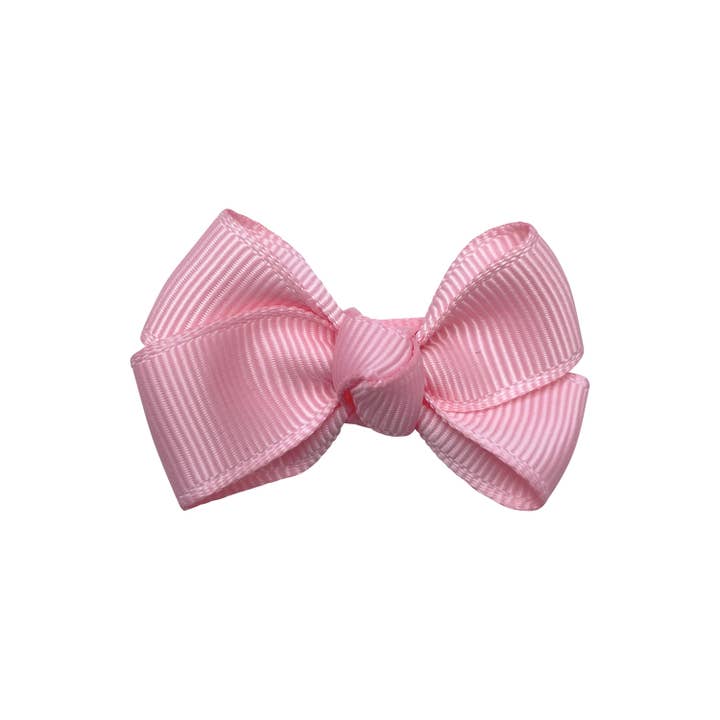 Estelle hair bow with clip in pink for wholesale by La Fillette Accessories