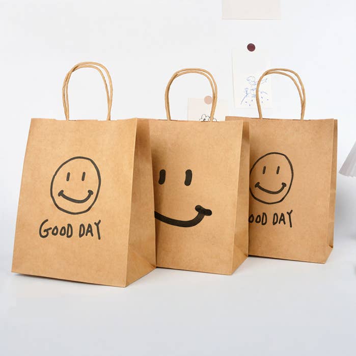 Sacos de Presente de Papel Kraft com Grafite de Carinha Fofa por atacado de ByHome